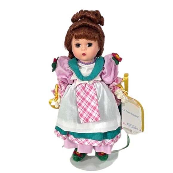 Madame Alexander restrung 8"Oz Flower Munchkin doll with stand.